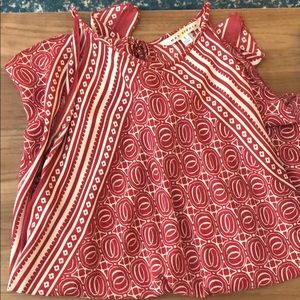 red and white patterned tunic